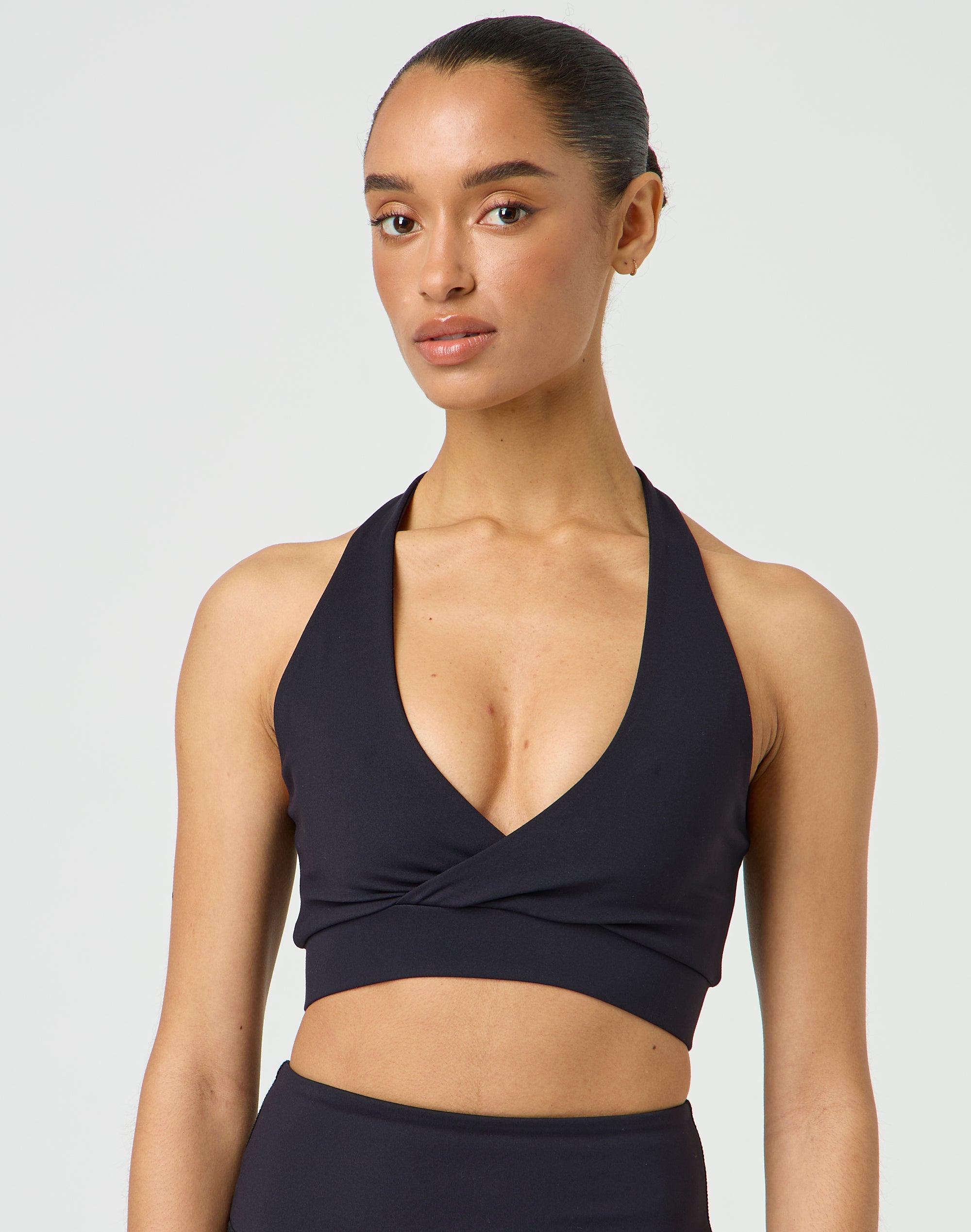 Halter style sports bra deals