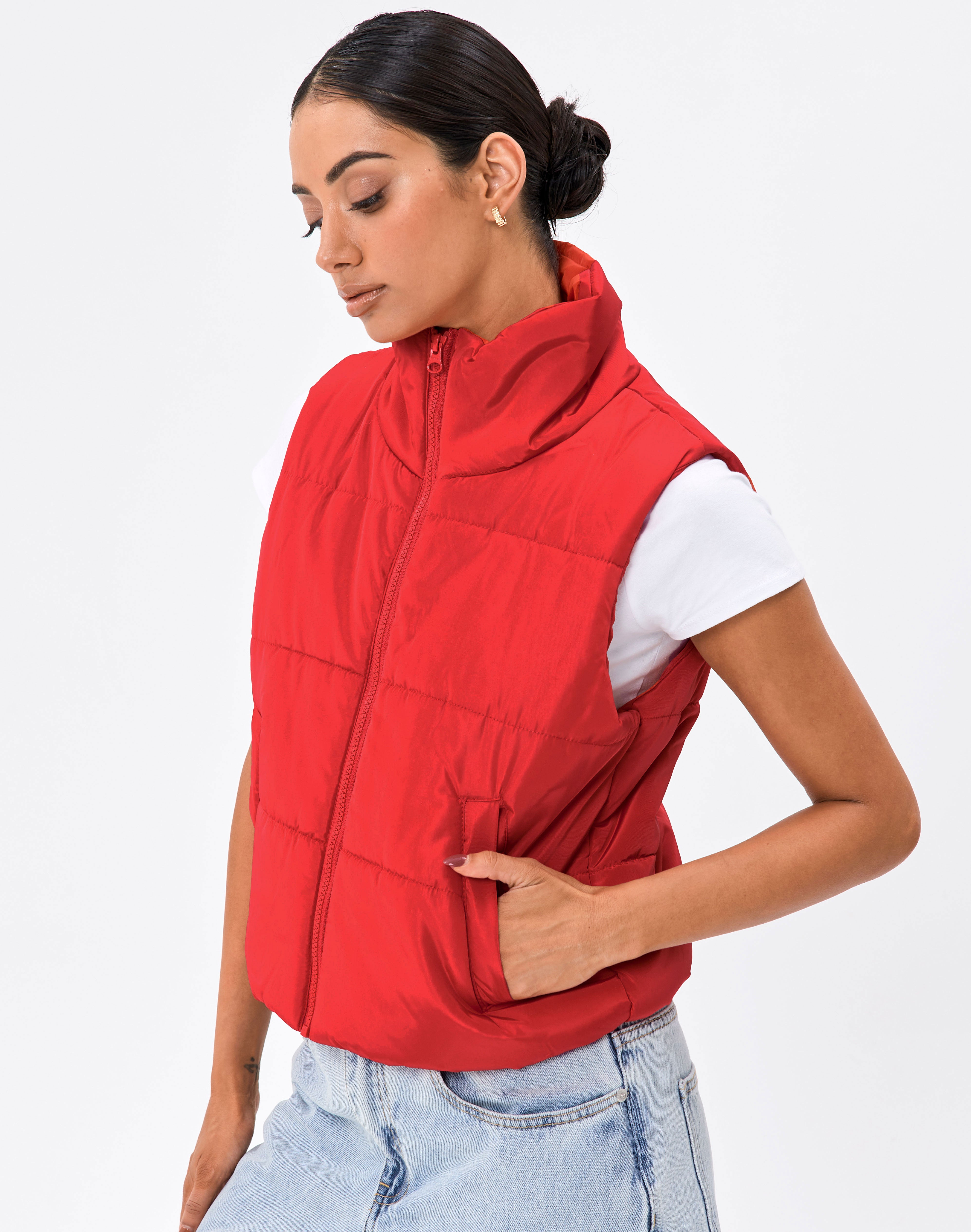 red orange puffer vest